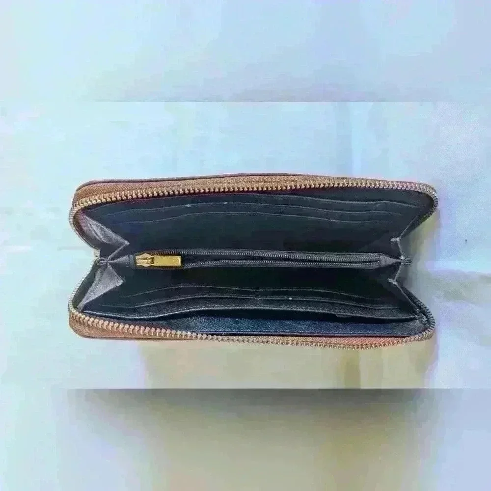 Brown Pebble Leather Fossil Zipper Wallet with Black Leathers Tassle